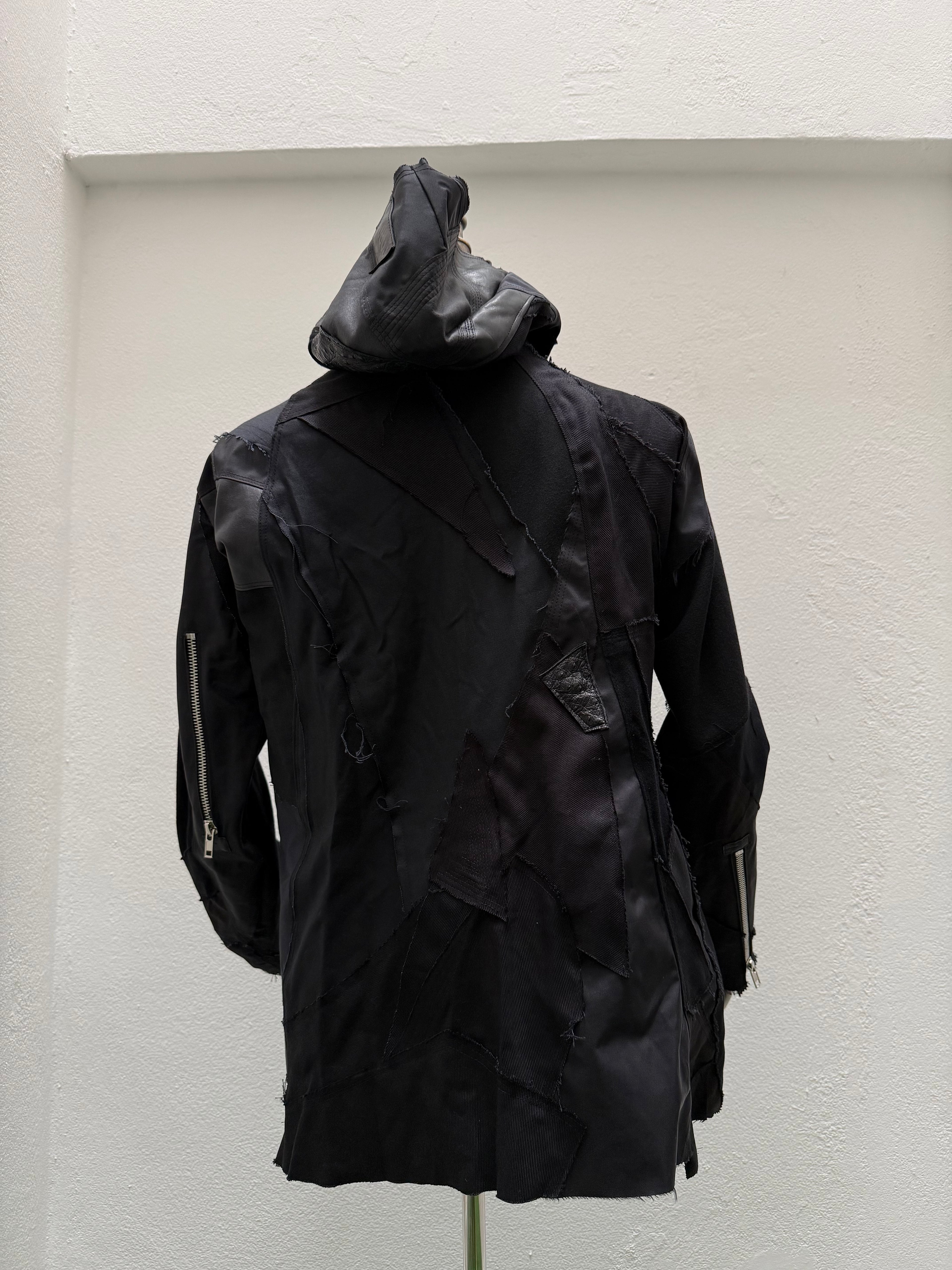 EC009 - MSJ

Masked Hooded Upcycle Jacket