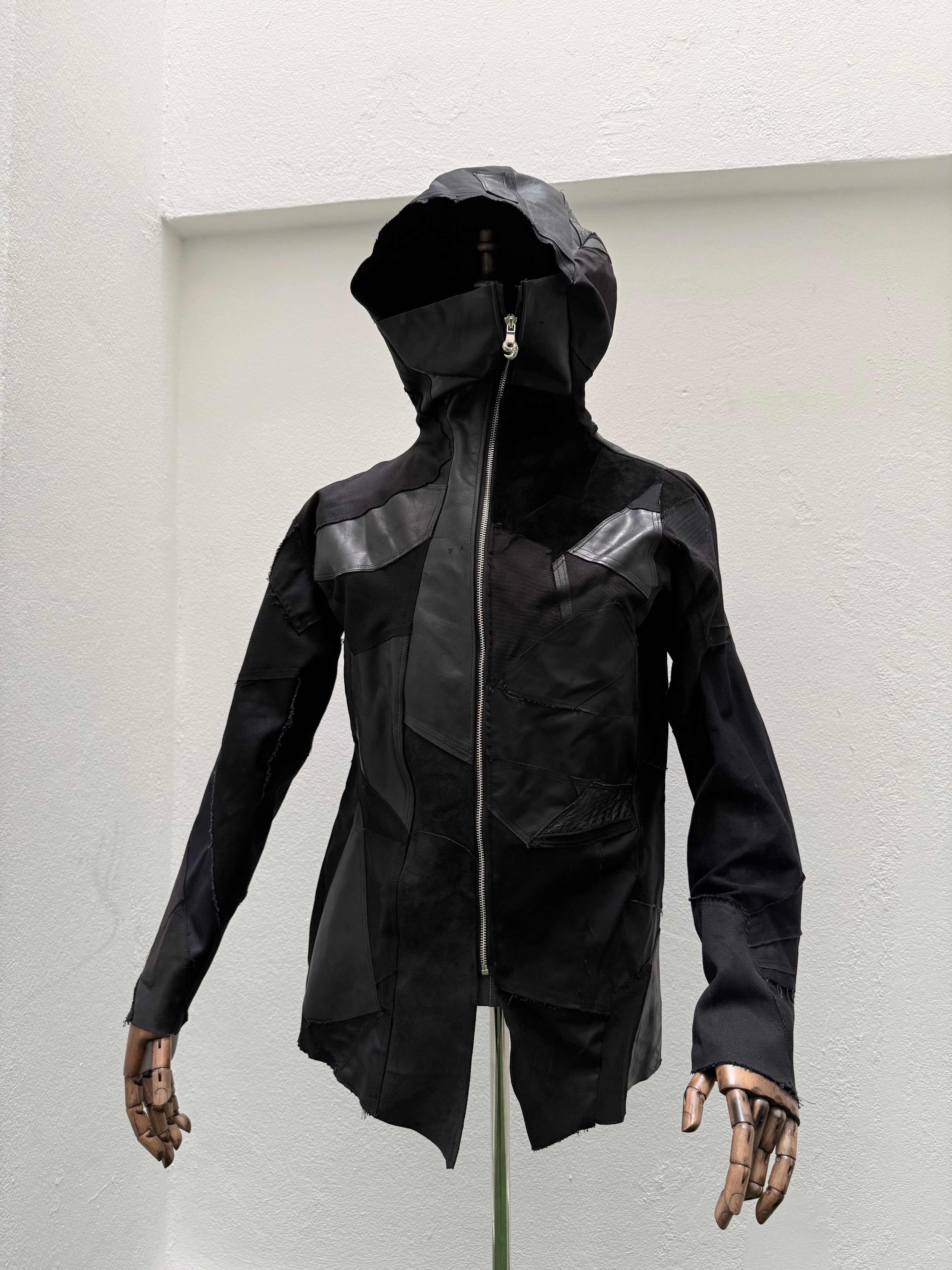 EC009 - MSJ

Masked Hooded Upcycle Jacket