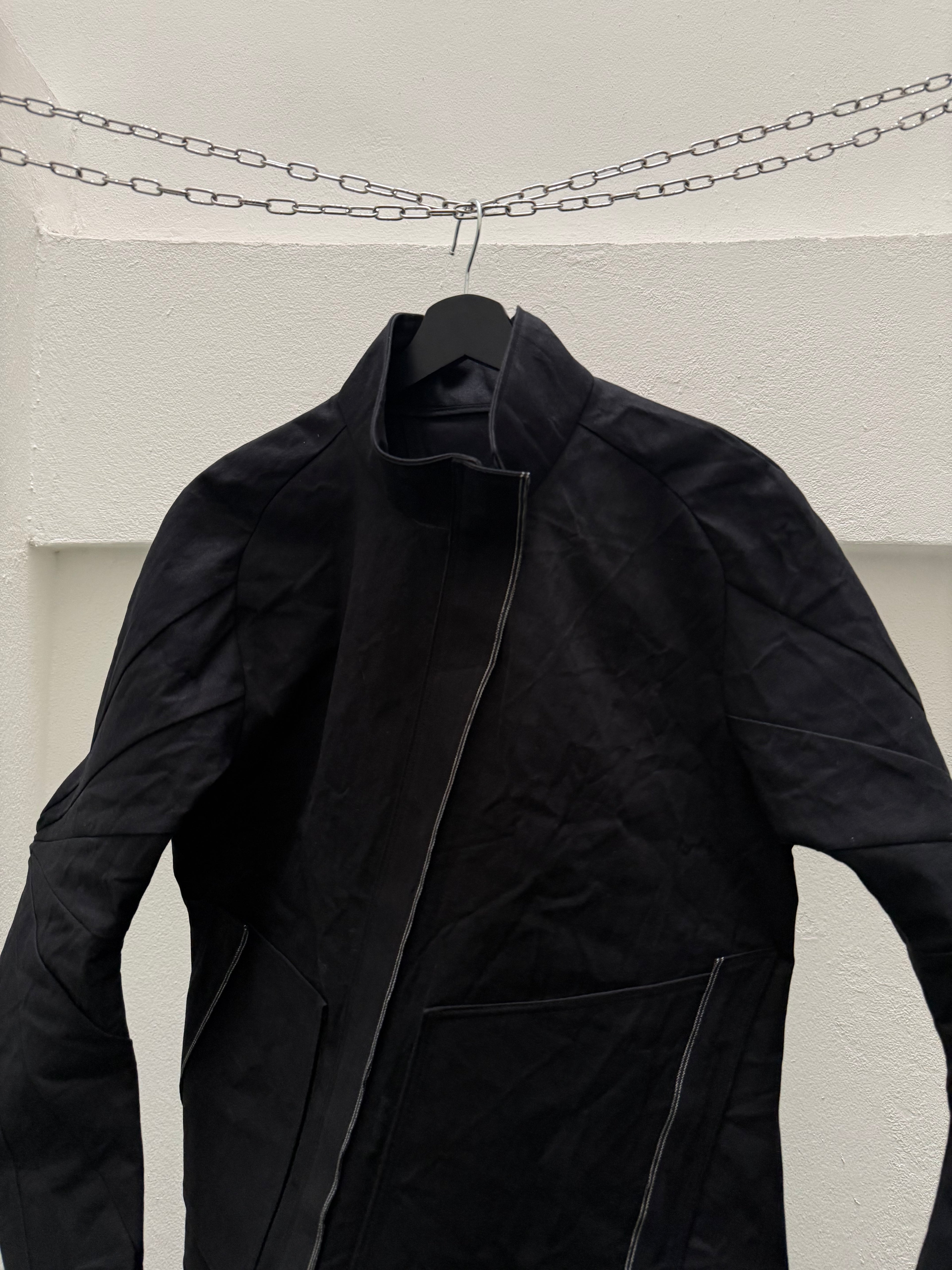 EC008-HSJ

High neck Slanted Jacket